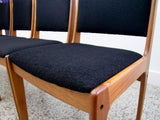 Johannes Andersen Teak Dining Chairs Upholstered in Black Boucle - Set of 4
